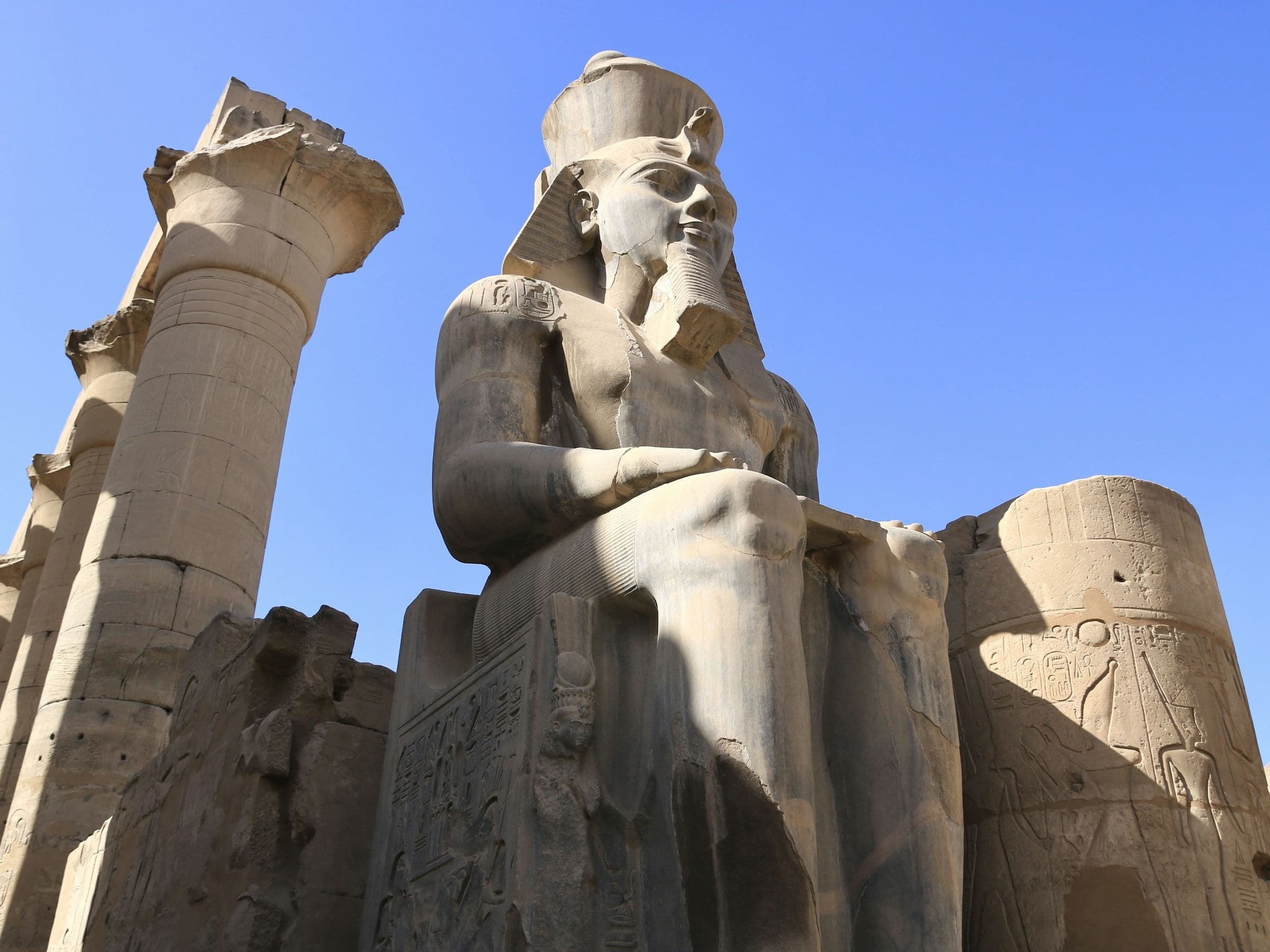A seated colossus of Ramses II at Luxor Temple